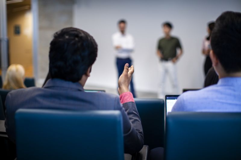 Two students in lecture hall