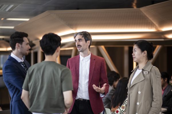 Students talking in building